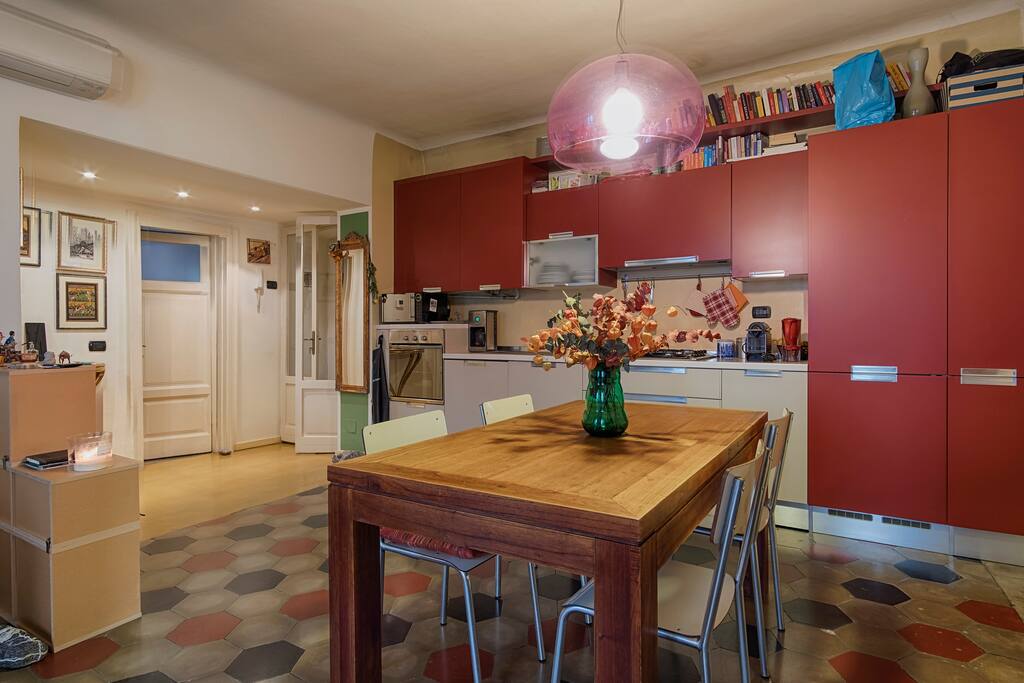 The kitchen and the living room on the left