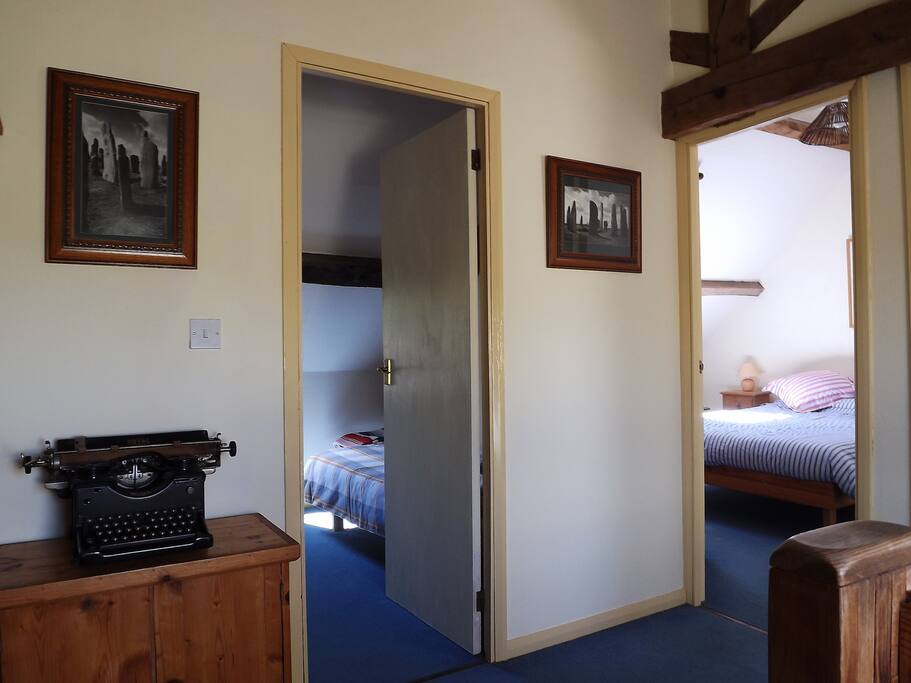 Upstairs, double bedroom on right, one of the singles on left.