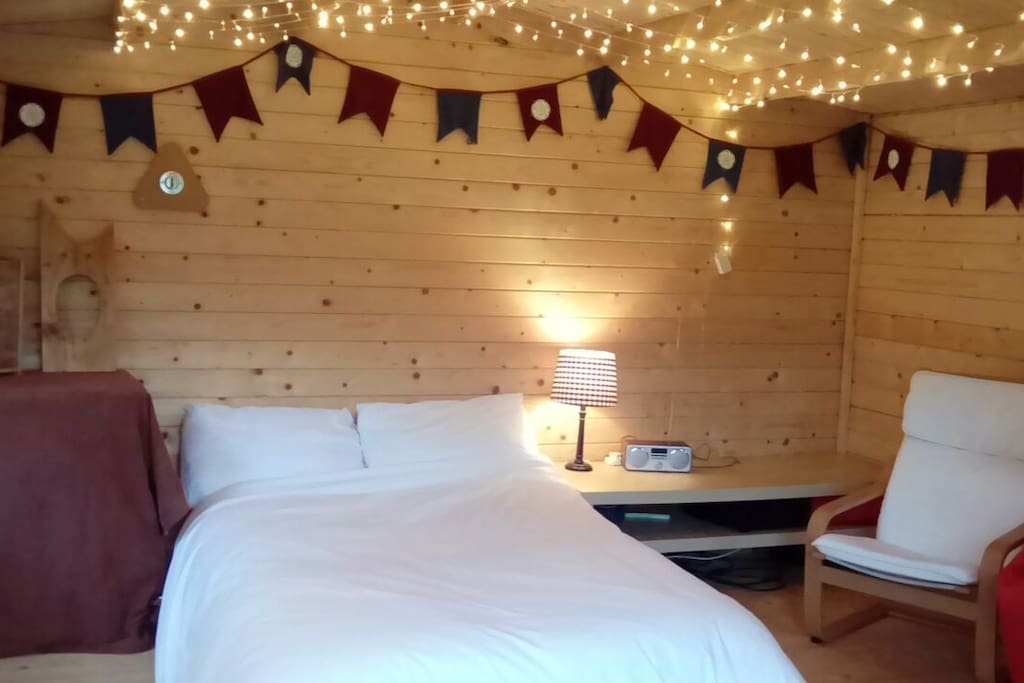 Double bed with fairy lights