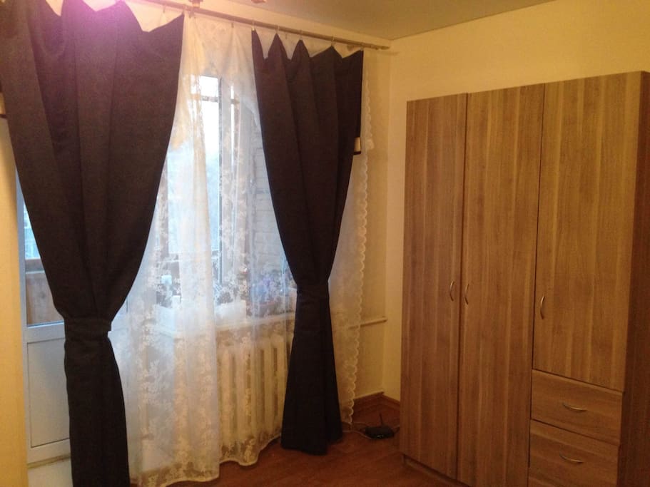 Balcony, cupboard, big windows
