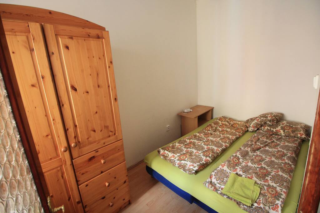 your private bedroom for 2 persons , 2 beds , writing desk , wardrobe