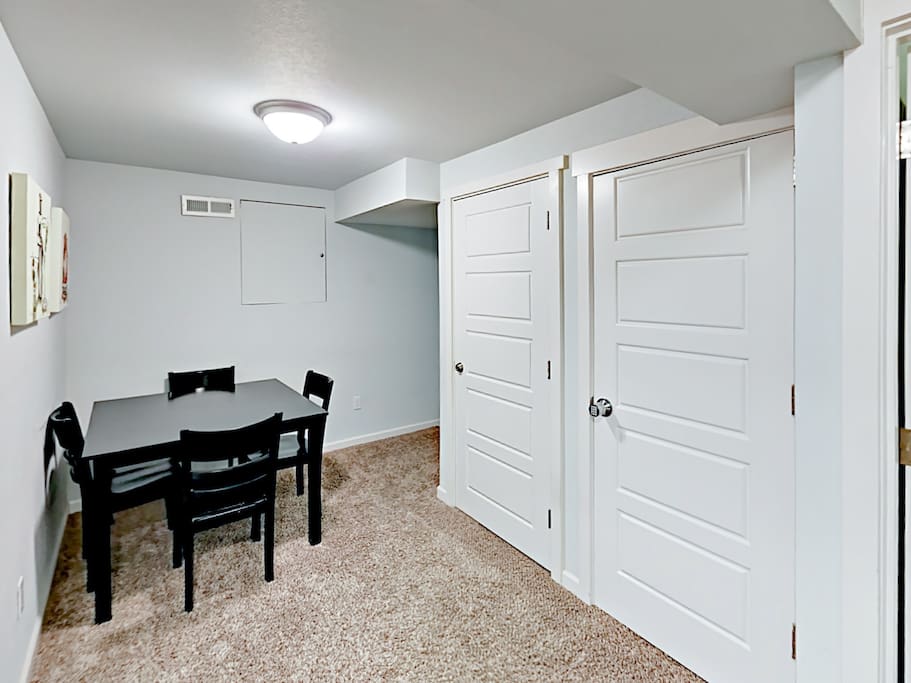 Gather at the 4-person dining table for festive vacation meals.