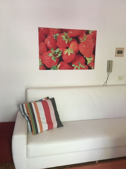 Salotto con divano letto in pelle