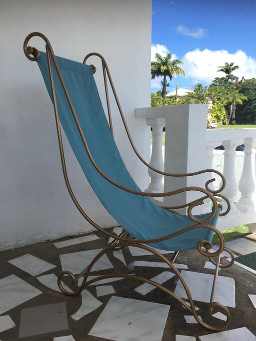 Chillax Bajan style on our sunny front veranda in our lovingly up-cycled antique loungers!