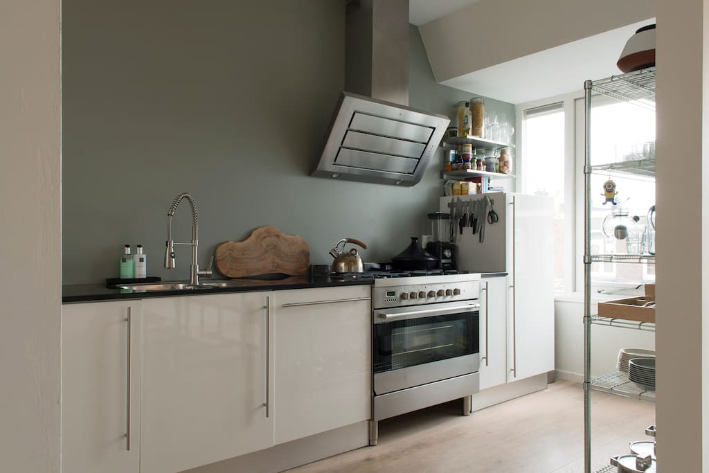 Fully equipped kitchen, including double oven and dishwasher.