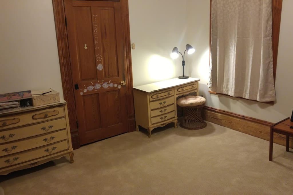 Dresser, desk, bookshelves, large closet.