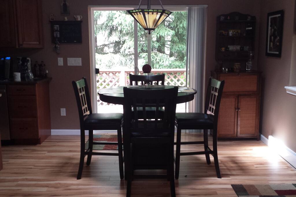 Dining room with slider to wrap around deck.