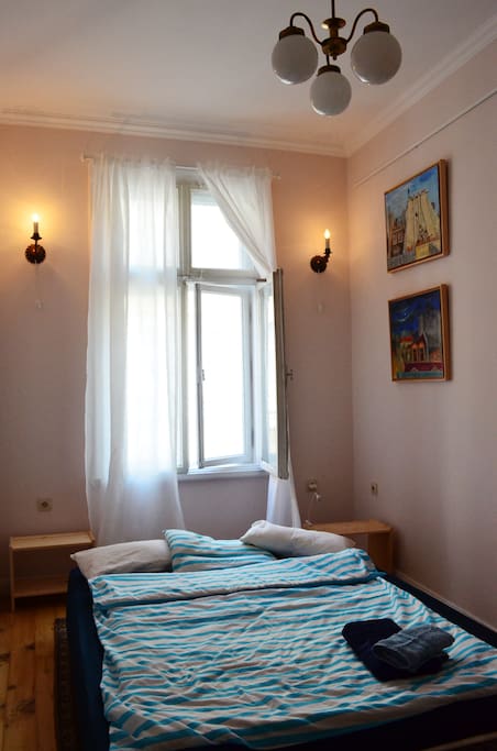 the room with a new comfortable bed