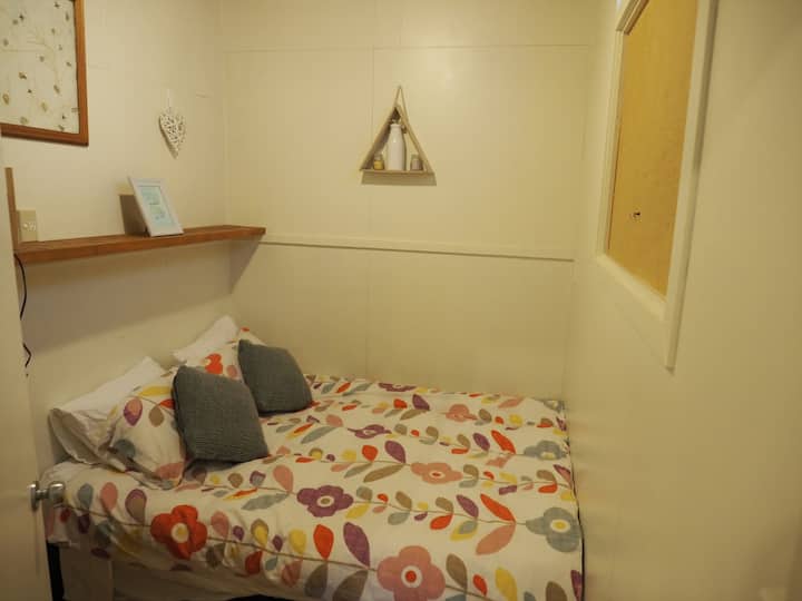 We also have 2 private rooms, one with a double bed and the other with a queen bed.