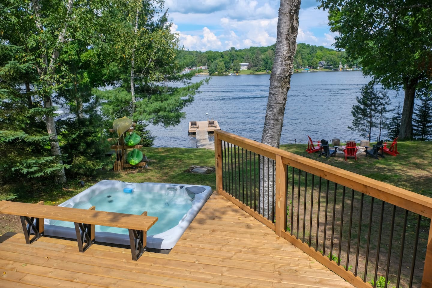 Cottage exterior surrounded by birch and pine