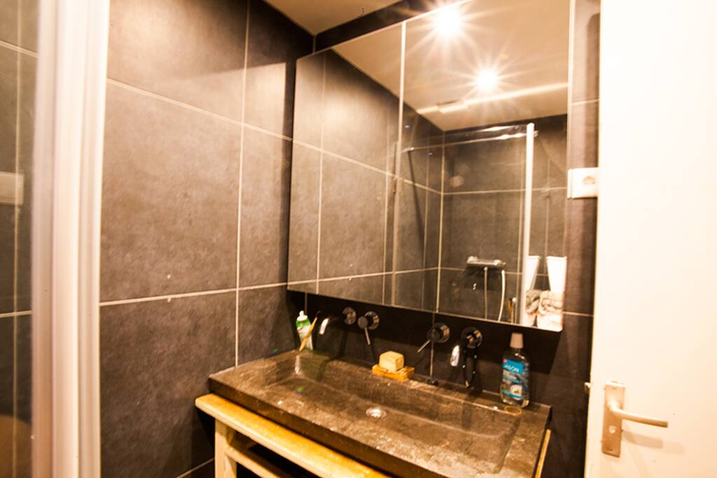 Double Tap and super wide mirror with loads of storage.