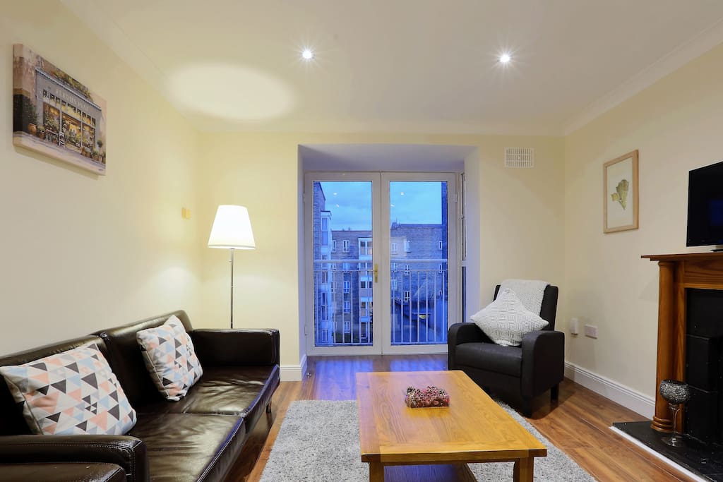 Bright and airy living room - with double sofa bed
