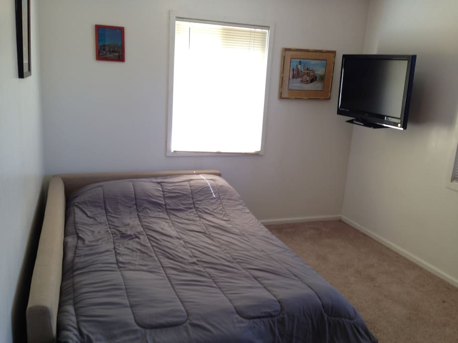 bedroom with own TV