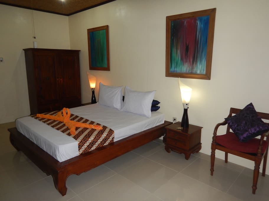 Queen sized teak bed with locking teak wardrobe