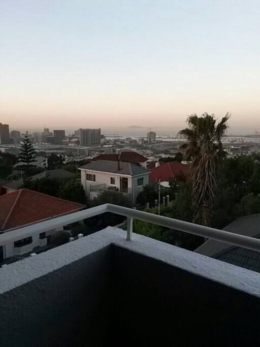 View from the balcony over the city and harbour bay.