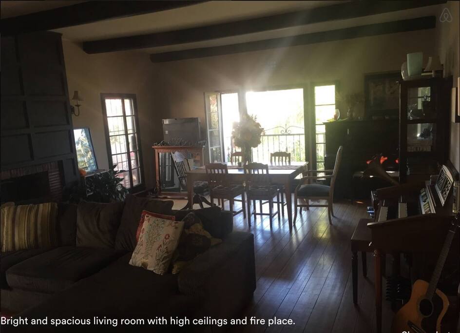 Huge living room. Outside balcony with chairs for relaxing. Piano, organ, guitar & record player for playing. Treadmill for exercise.