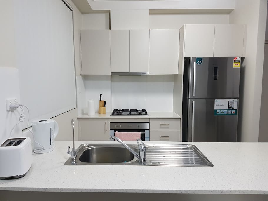 Fully functional U-shape kitchen with everything you need to cook an amazing dish or bake an amazing cake, even while on holiday or business