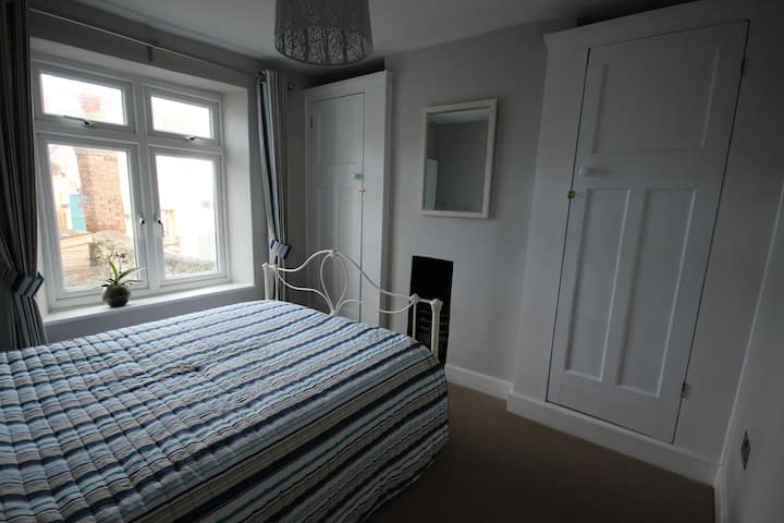 Double bedroom.  This faces to the rear of the property and overlooks the small courtyard.   The combination bolier is located in cupboard nearest to the window.   