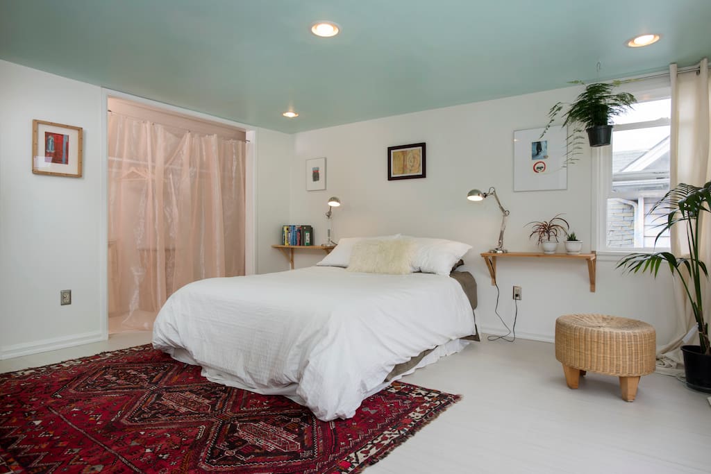 master bedroom with very cozy bed and everything you need for dreamy sleep