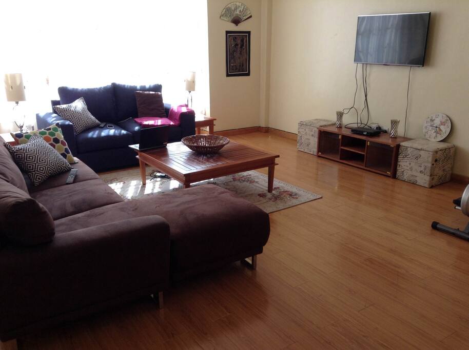 View of the living room with floor to ceiling windows