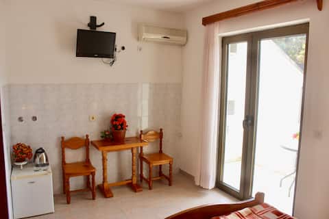 Successful Airbnb property: NIR Apartments- twin room with terrace in Budva Polje