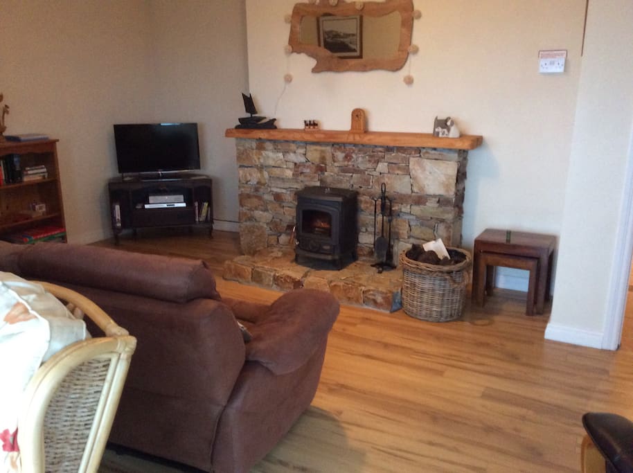 Sitting room with traditional turf burning stove