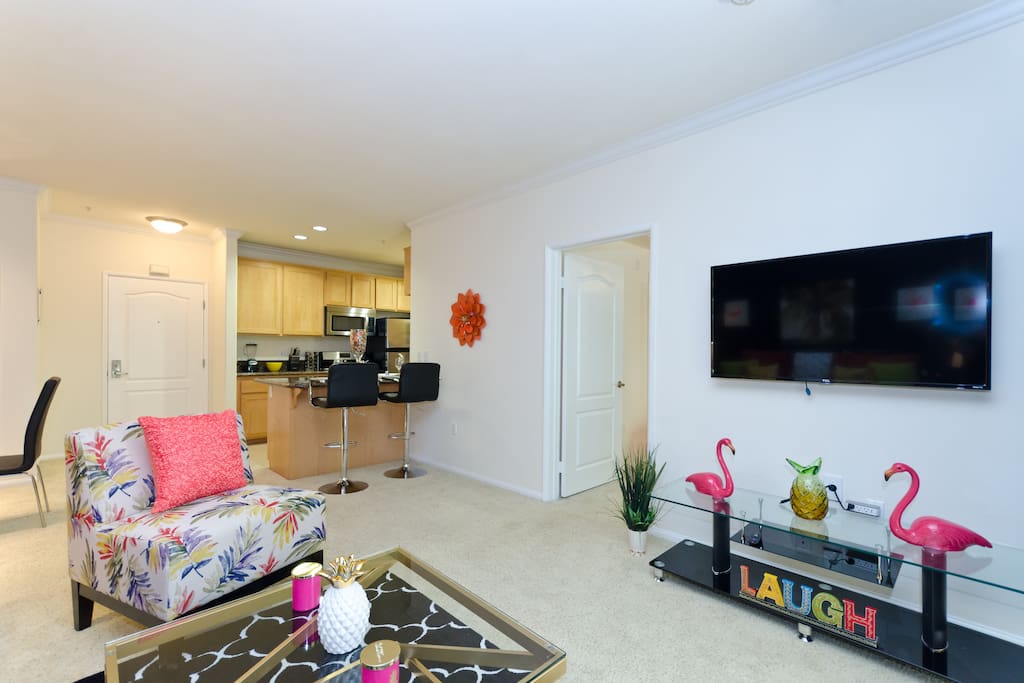 Spacious living room with HD TV and beautiful decor