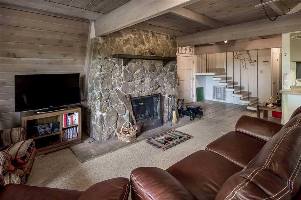 Sink into the cool leather sofa as you and your guests settle in for the evening.