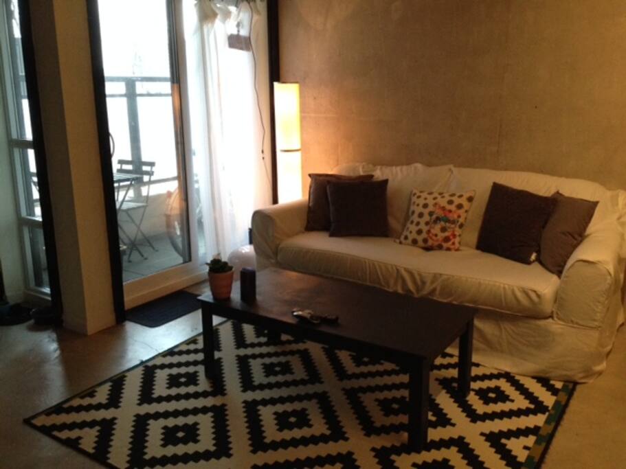 Exit to patio and terrace.
Concrete wall, floor and ceiling.