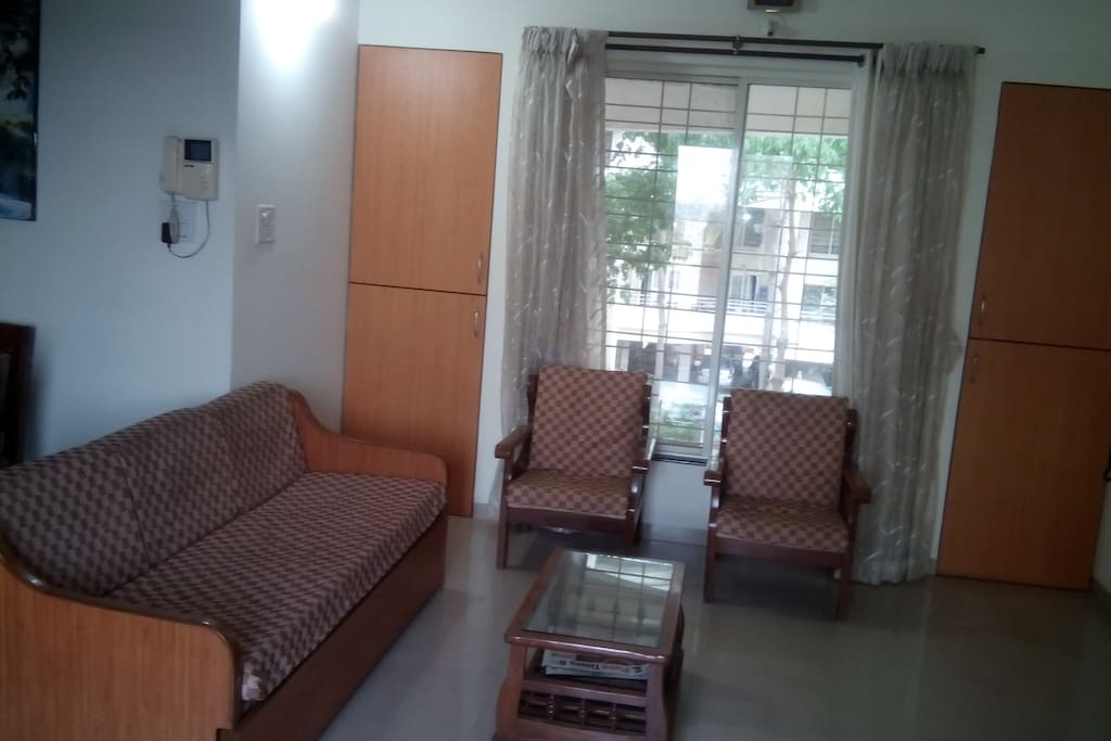 Sitting area with garden view and attached balcony with farm view