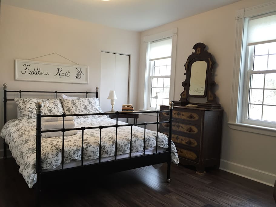 Queen bed with new sheets, and fluffy duvet