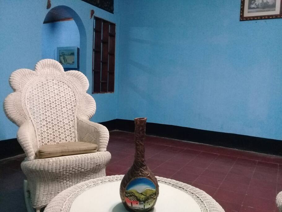 área comunal, de estancia, lectura o recibimiento.
