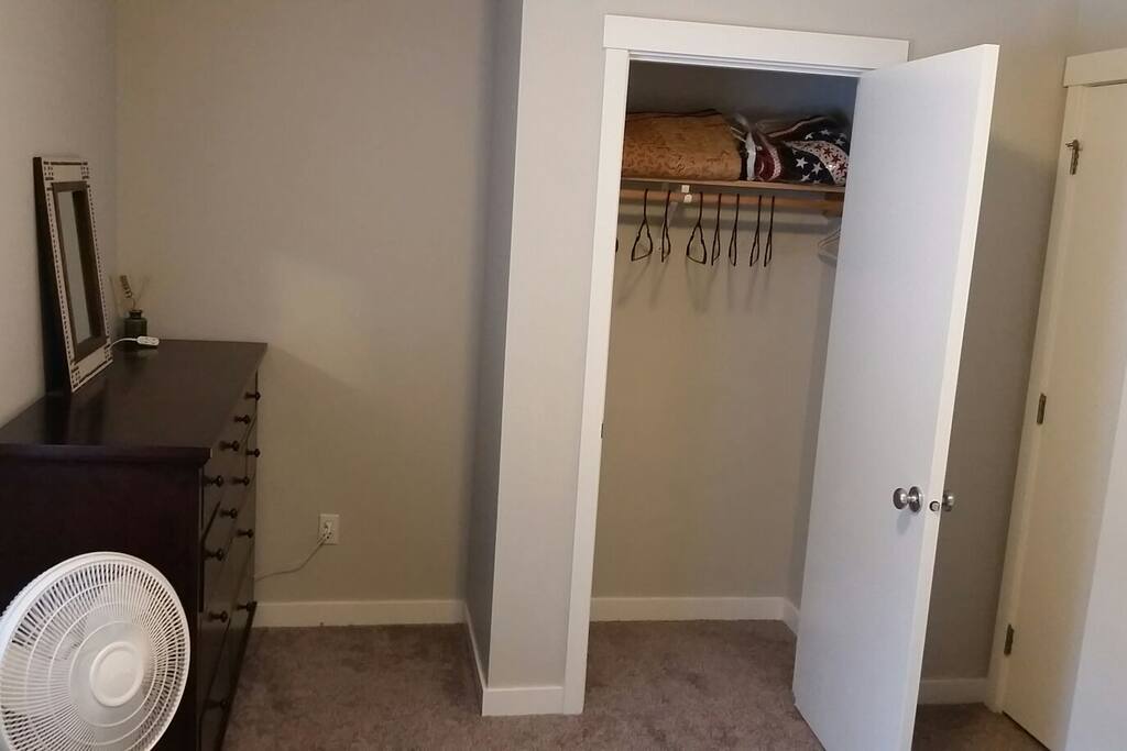 Closet space with provided hangers (if you need more, just ask). Also provided with a fan, blankets, and a space heater if needed.