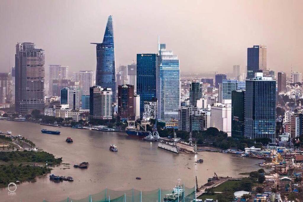 Epic view of the city with the iconic Financial Bitexco tower can be seen from both bedrooms