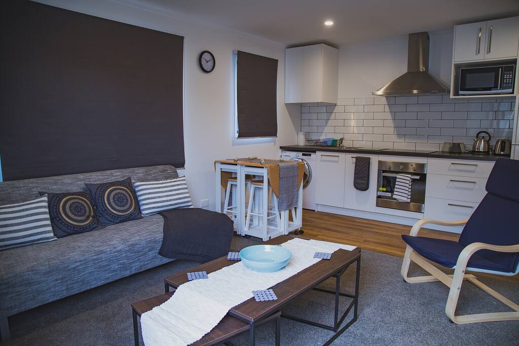 Spacious living area with full kitchen