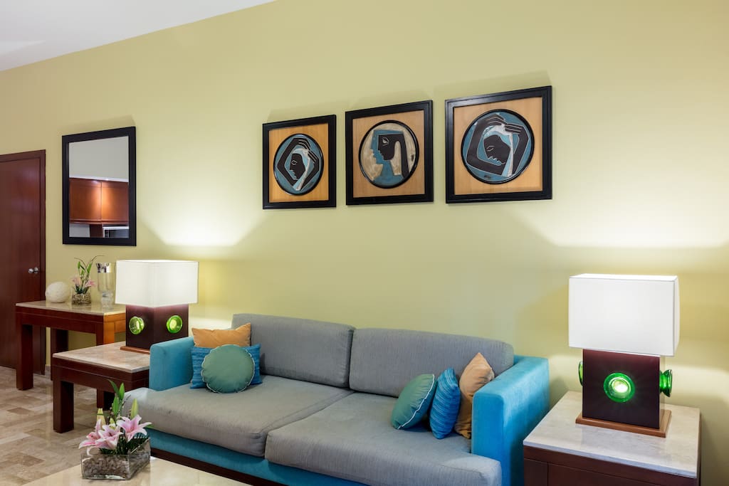 Splashes of tropical color and Mexican-inspired accents are featured in the living area.