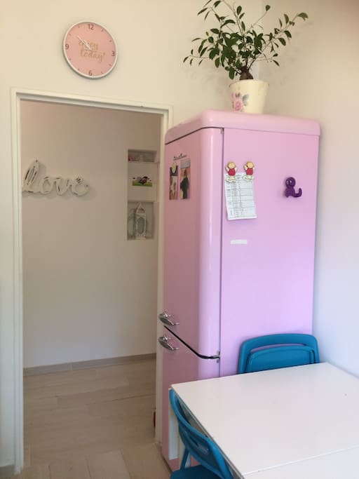 Kitchen with a big fridge and freezer.
