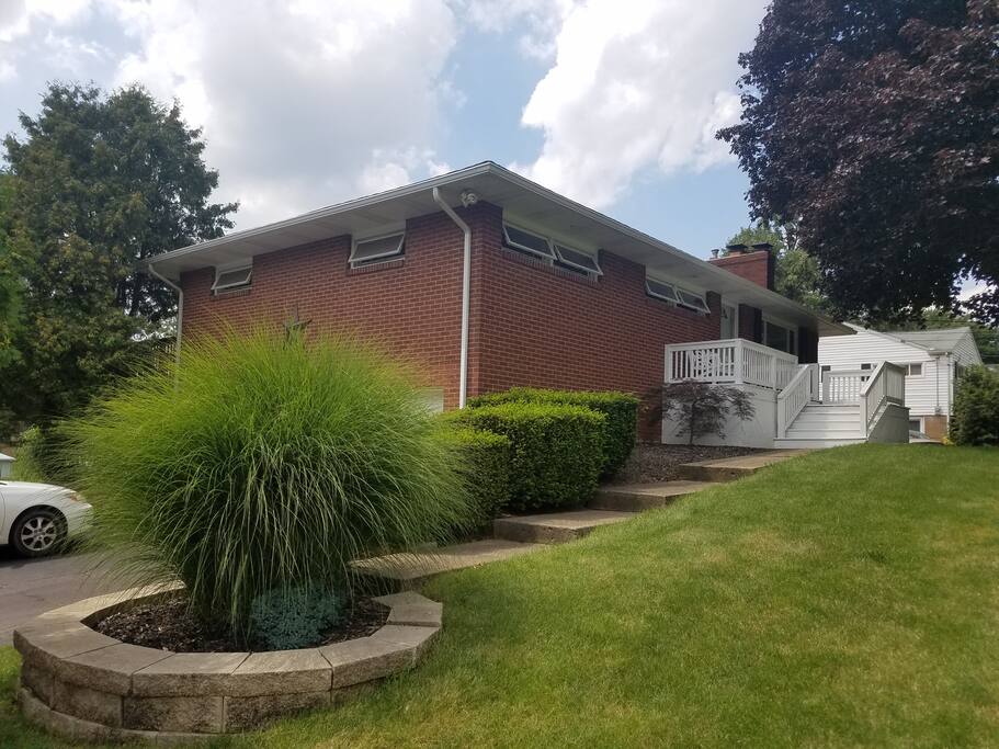 The walkway from the drive way and garage area to the front door. This is the main entrance to the Airbnb residence. The Airbnb portion of the residence cannot be accessed from the first floor garage, or drive way parking area.