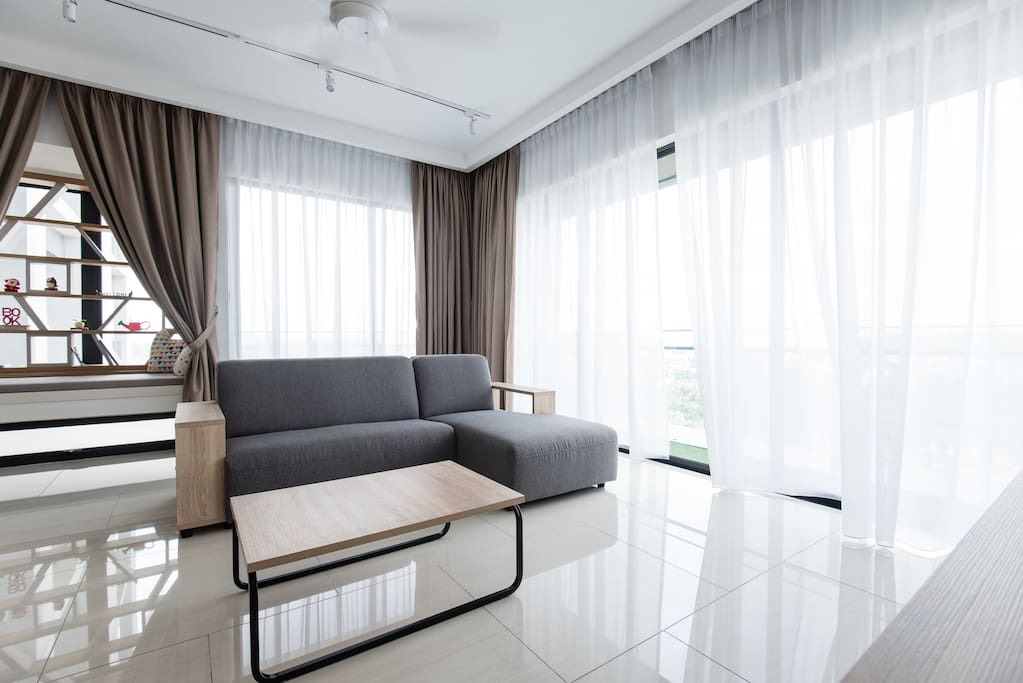 L-shapes sofa & balconies.