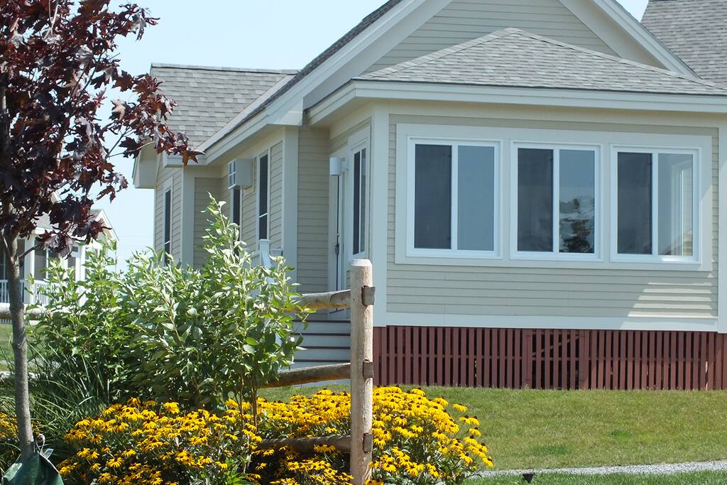 Image shown are examples only of cottages that may be available during you stay.