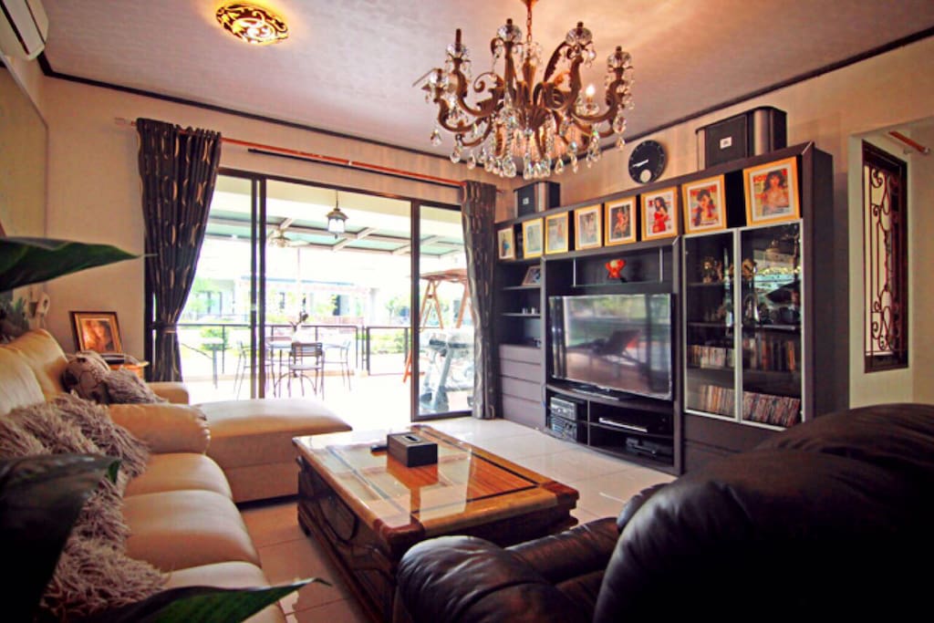 Living room with access to terrace and swimming pool