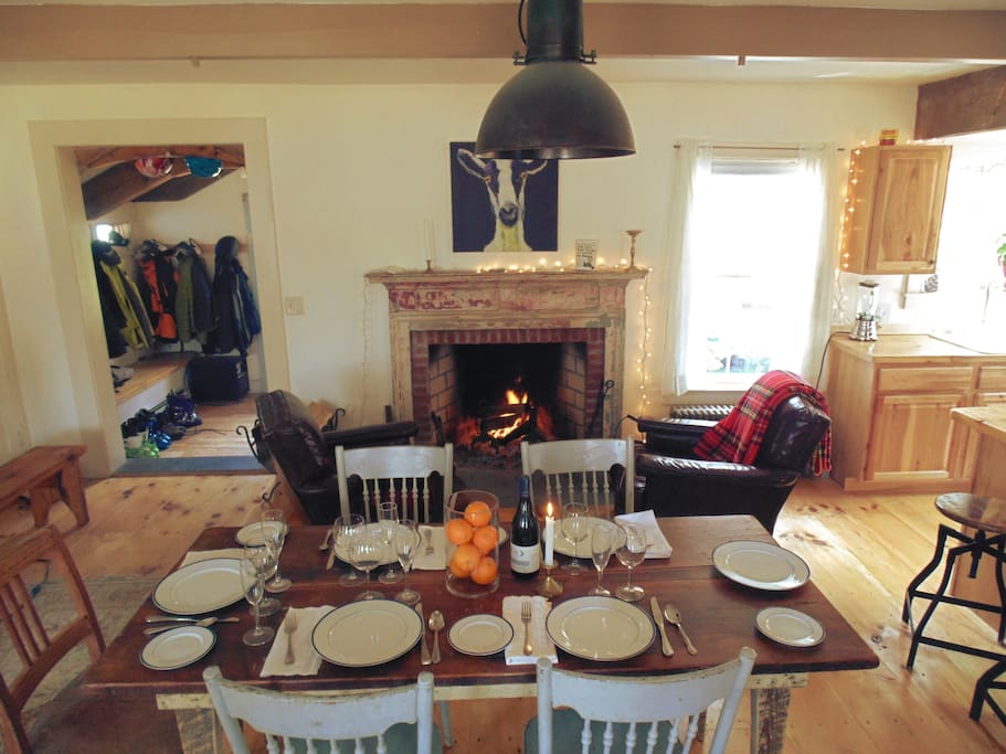 Dining area in large country kitchen. Another table allows seating to be extended.