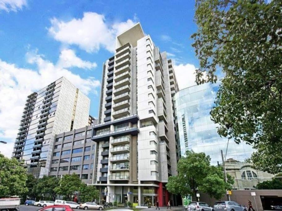 The apartment building has two elevators, a gym and paid parking in the next building.