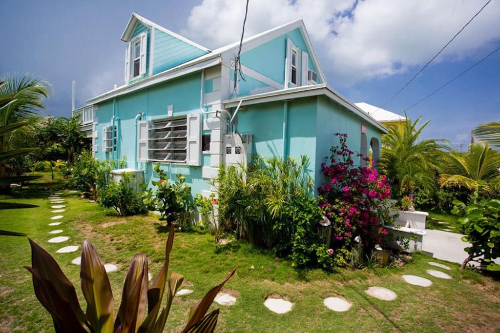 A typical Island home with a beautiful tropical flowering garden.