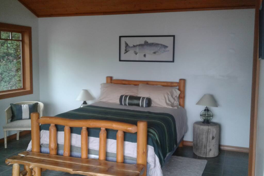 Queen bed. Rainforest and water views.