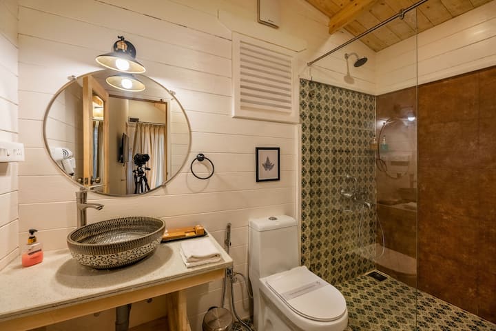 Your private ensuite bathroom includes hot water, complimentary toiletries, and all the essentials for a refreshing experience after a day exploring Morjim Beachfront