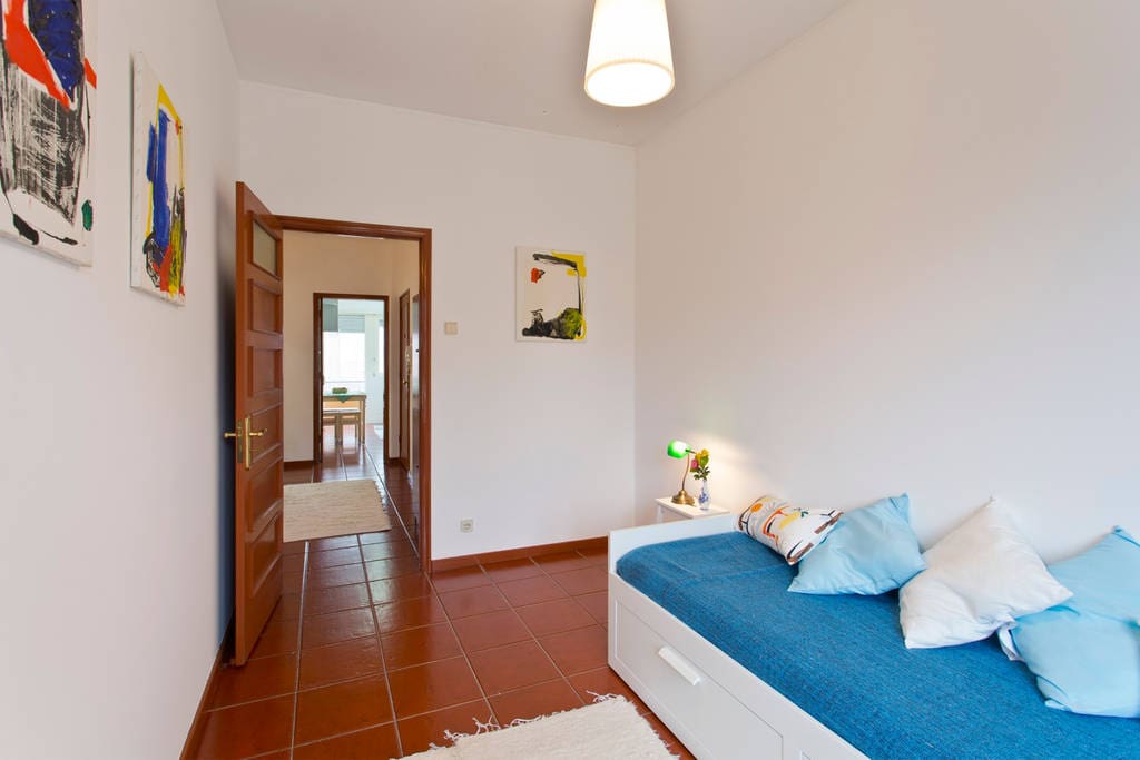 Bedroom 2 - It has a sofa that turns into a large bed, ideal for a couple. It also has access to the balcony.