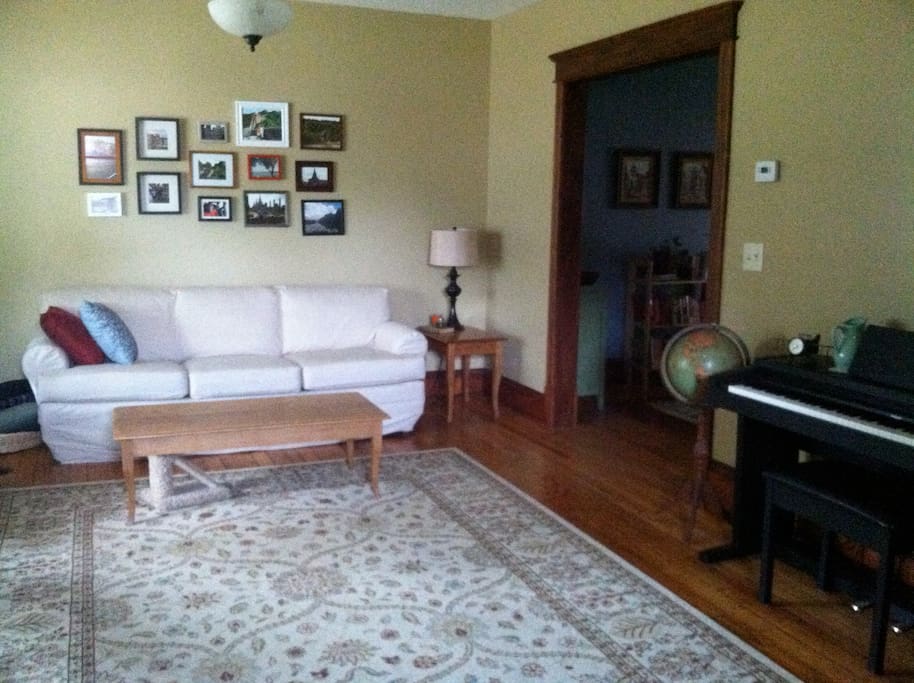 Living room provides ample seating and lots of light