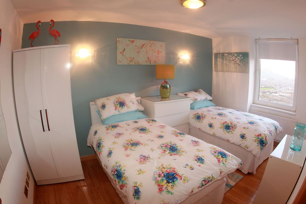 Twin room with stunning views. Comprises of wardrobe x2 chest draws.