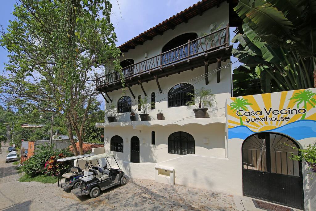 Entrance of Casa Vecino. Our entrance features a secure coded door look and lots of outdoor lighting to help you find your way
